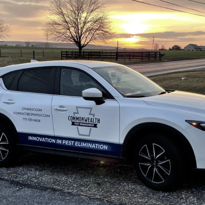close up of commonwealth pest management truck after pest control service lancaster pa