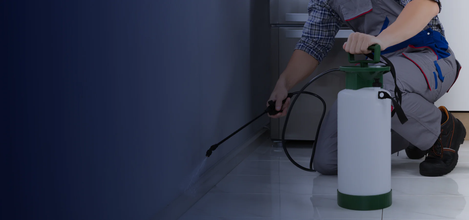 exterminator spraying insecticide during pest control service lancaster pa